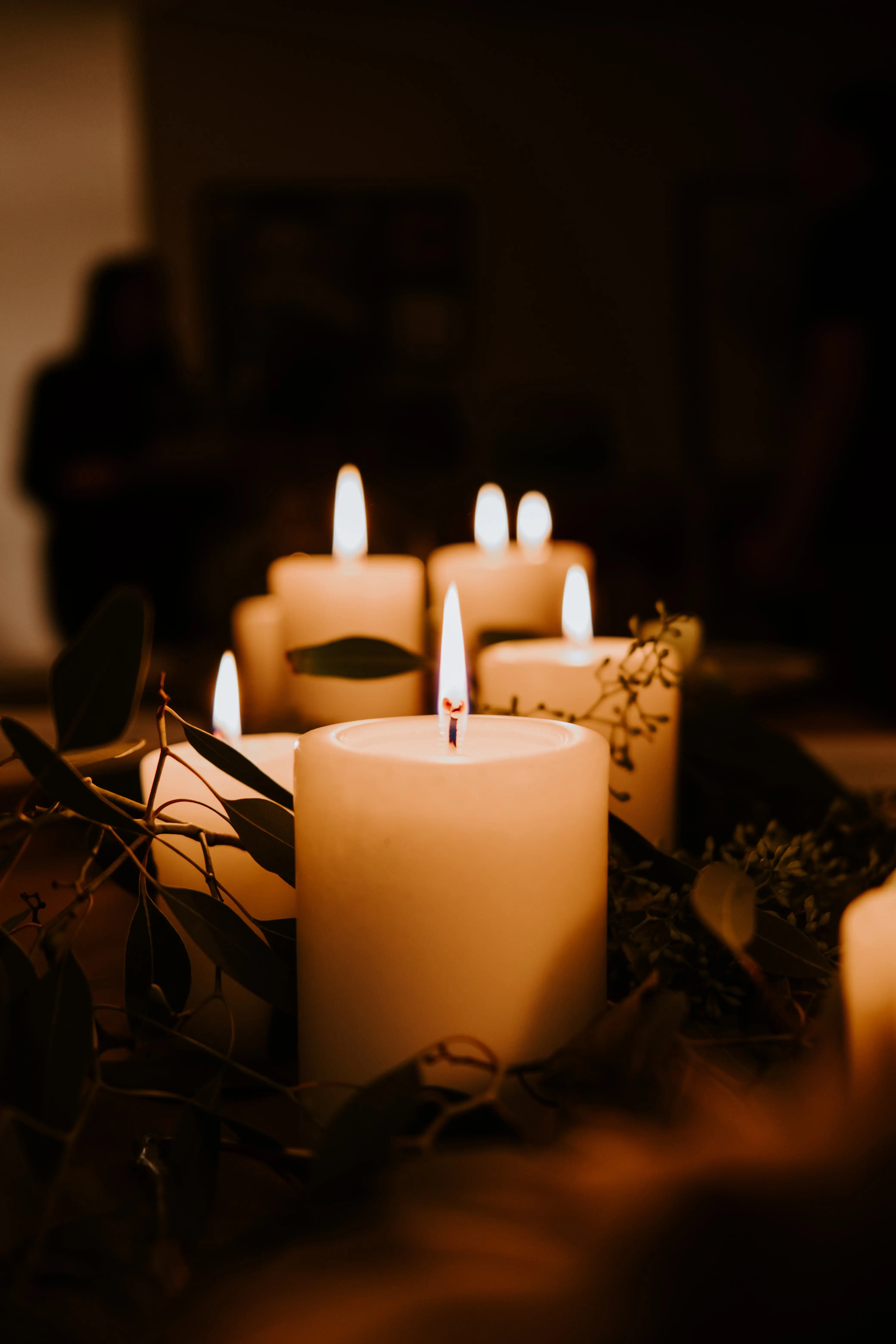 Lit candles at a memorial